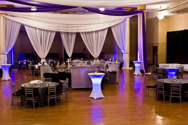 Ballroom Decor with white and purple chiffon