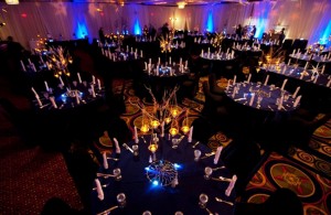 Elegant room and table decor set the stage for an unforgettable corporate event.