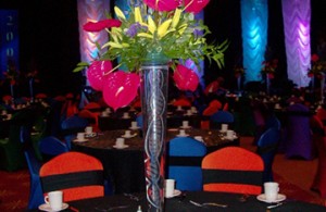 A fun and funky floral centerpiece with DNA like design in the center.