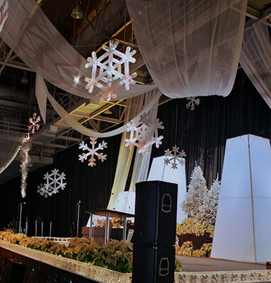 Holiday Stage decor with snowflakes and towers