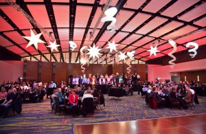 Inflatable stars hang from the ceiling to create an intimate event space.