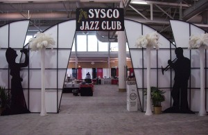 A Jazz club is brought to life with themed decor for a trade show.