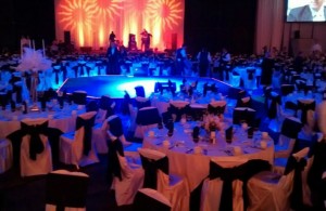 Meeting dinner setup with center stage performance